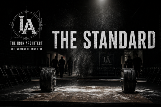 Empty powerlifting platform with barbell and chalk dust under a spotlight, featuring “THE STANDARD” text and Iron Architect IA logo with “Not Everyone Belongs Here.”