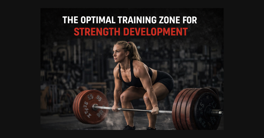 Female athlete performing a controlled overhand grip deadlift in a gritty gym demonstrating optimal training zone for strength development.