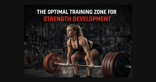 Female athlete performing a controlled overhand grip deadlift in a gritty gym demonstrating optimal training zone for strength development.