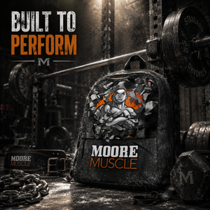 MooreMuscle Performance Backpack beside a loaded power rack, weight plates, chains, and lifting equipment in a dark warehouse gym.
