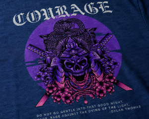 Close-up detail of the Courage Collection samurai skull graphic featuring purple and pink artwork inspired by Dylan Thomas.