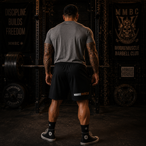Rear view of MooreMuscle Five Rings training shorts showing the MooreMuscle logo placement.