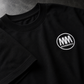 Black t-shirt with a white embroidered MM logo on a dark background