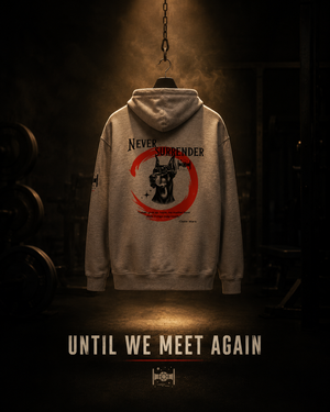 Never Surrender zip hoodie back graphic featuring a Doberman design and red circle artwork.