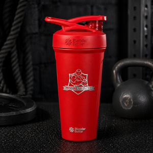 MooreMuscle red stainless steel shaker bottle with flip lid on gym floor with kettlebell
