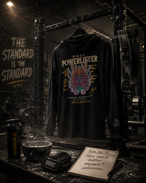 MMBC Powerlifter t-shirt hoodie displayed in an empty powerlifting gym