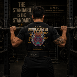Black Warrior Collection t-shirt worn during pull-ups in a strength training facility