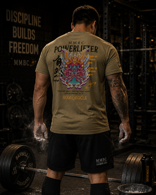 Olive Warrior Collection t-shirt worn by athlete preparing for a deadlift in a powerlifting gym