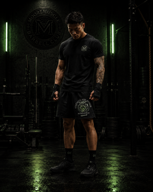 Athlete standing before training wearing Strength and Honor performance shorts