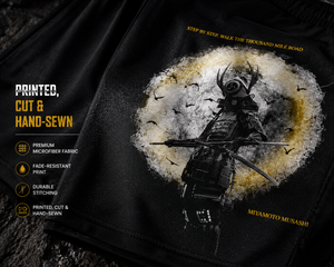 Close-up detail of Thousand Mile Performance Shorts highlighting the samurai warrior artwork and premium performance fabric.