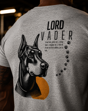 Close-up of the Lord Vader memorial tee graphic showing paw prints and Doberman artwork on tri-blend fabric.