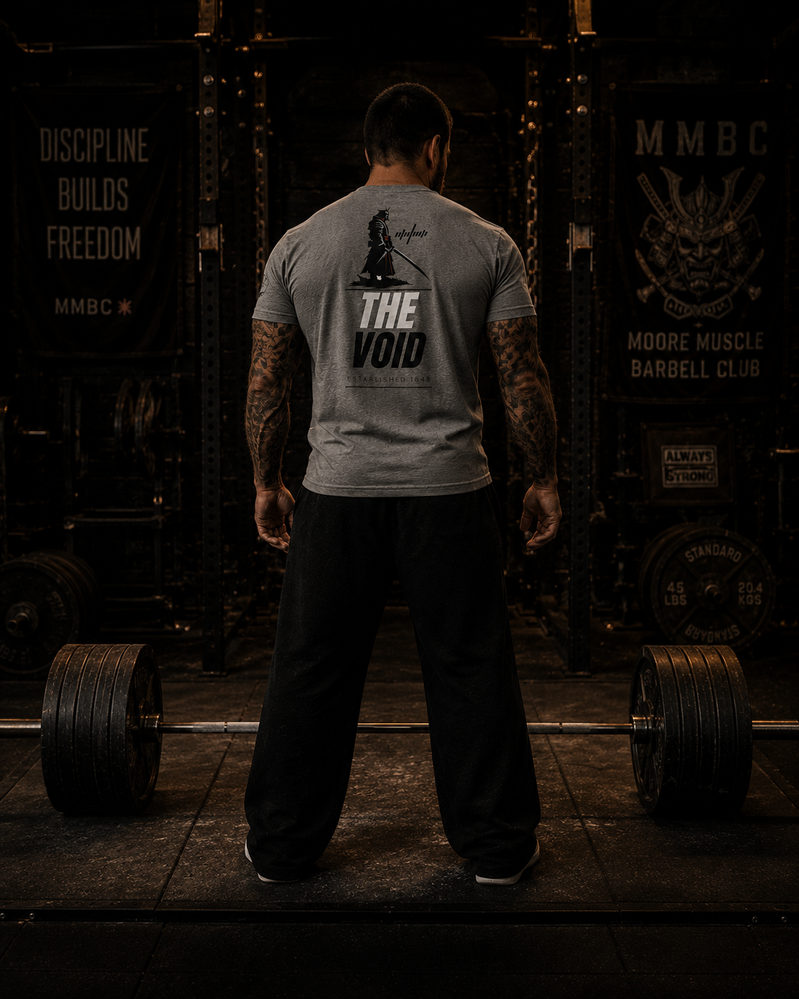 The Void tri-blend tee worn during deadlift setup inside a powerlifting gym.