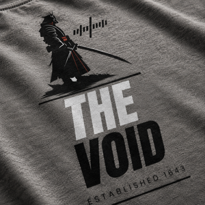 Close-up detail of The Void back graphic printed on a gray tri-blend tee.