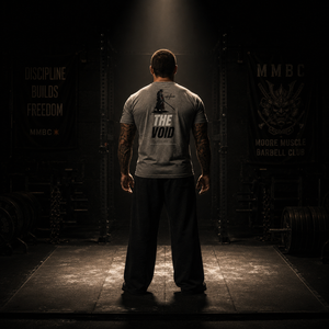 The Void tri-blend tee under dramatic lighting representing calm focus and discipline.