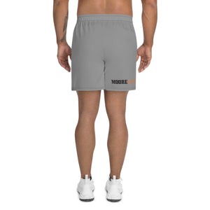 Male athlete wearing MooreMuscle Day of the Deadlift performance shorts rear view with MooreMuscle branding