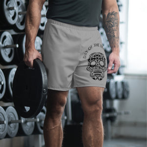Close gym lifestyle image of MooreMuscle Day of the Deadlift shorts with skull graphic during strength training session