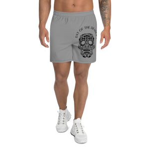 Male athlete wearing MooreMuscle Day of the Deadlift gym shorts front view showing skull graphic on left leg