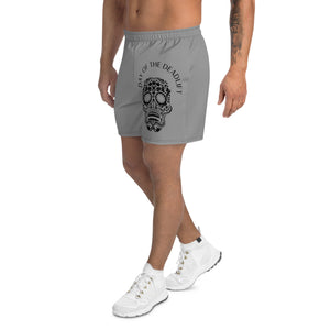 Male athlete standing at angle wearing MooreMuscle Day of the Deadlift athletic shorts highlighting skull artwork