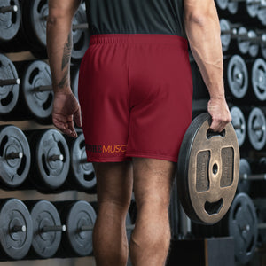 Athlete wearing maroon SQUAT shorts from behind in gym, back fit and waistband shown.