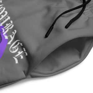 Close-up of Courage sweatpants fabric showing elastic waistband and drawstring detail