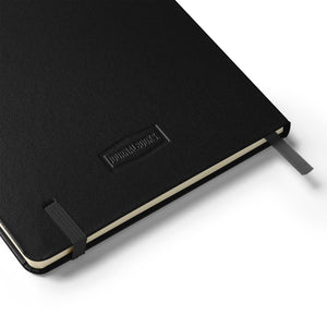 Close-up detail of black Vader hardcover notebook with ribbon marker and elastic closure