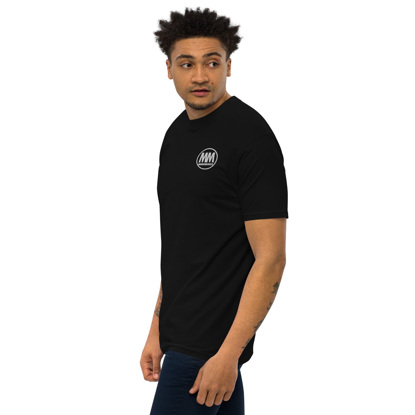 Men’s black MooreMuscle MM embroidered heavyweight t-shirt side view on male model
