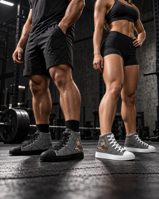 Male and female lifters in a powerlifting gym wearing MooreMuscle Crest grey high top lifting shoes with black and white soles