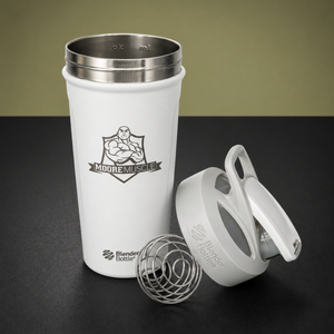 MooreMuscle white stainless steel shaker bottle with lid off and whisk ball on surface