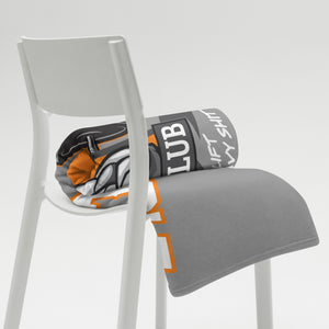 MooreMuscle throw blanket draped over chair showing side angle