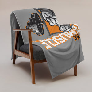 MooreMuscle Barbell Club throw blanket draped over chair showing full design