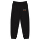 Burn The Ships heavyweight black fleece sweatpants featuring white and orange embroidered Burn The Ships EST. 1519 artwork on the upper thigh.