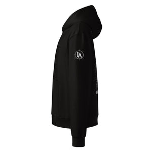 Side view of the Iron Architect heavyweight hoodie with IA sleeve logo and oversized fit.