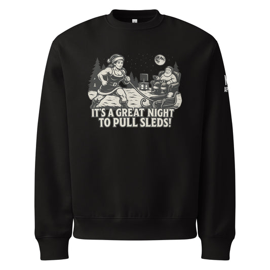 Black sweatshirt with graphic design and text 'It's a great night to pull sleds!' on a white background