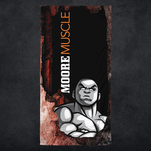 MooreMuscle grunge beach towel with black, red, and distressed texture design featuring bold vertical MooreMuscle text and illustrated strength figure, displayed against a dark textured background