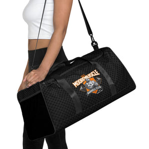 Athlete carrying MooreMuscle Barbell Club duffle bag with shoulder strap