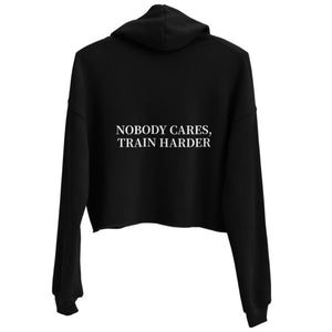 MooreMuscle MMBC cropped hoodie black back view with “Nobody Cares Train Harder” text